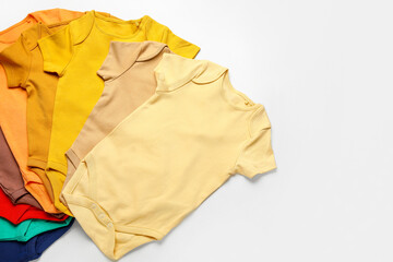 Baby clothes on white background