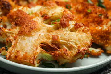 Plate with tasty fried cauliflower, closeup