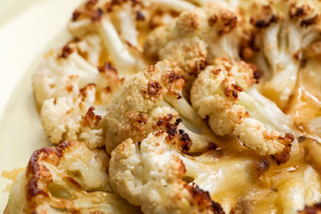Tasty fried cauliflower and cheese, closeup
