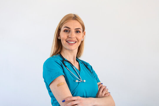 Vaccinated young Doctor, medical worker, nurse Woman Approving Vaccination, white Background