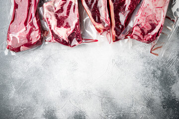 Vacuum packed organic raw beef classic cuts, tomahawk, t bone, club steak, rib eye and tenderloin...