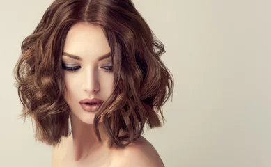 Zelfklevend Fotobehang Beautiful model girl with short hair .Woman brunette  with curly hair. Red head .  © edwardderule