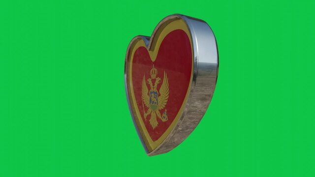 Flag of the Montenegro in the shape of 3D heart.Looped video of 360 degrees rotation. Metallic heart with glass and relief elements of the country flag. Animation with green screen.