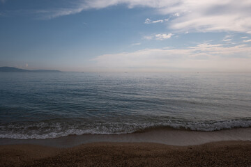 blue sea and sky with clouds