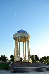 Central city park "Urda". A monumental building with a dome. Jizzakh. Uzbekistan.