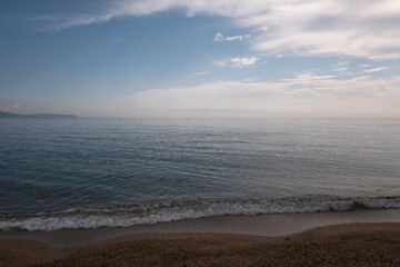 blue sea and sky with clouds