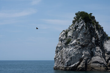 Fototapeta na wymiar Big rocks and blue sea