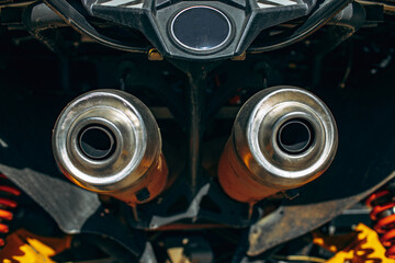 Exhaust pipe of ATV car close up