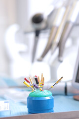Thin dental drills for deep penetration into the root of the tooth. Photo for the background. Out...