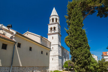 Fototapeta na wymiar Historic architecture in Biograd, bell tower of St. Stosija church, Dalmatia, Croatia