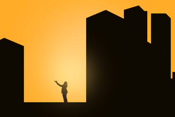 Silhouette of a businessman standing and raised hands
