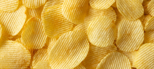 crispy golden potato chips snack texture background