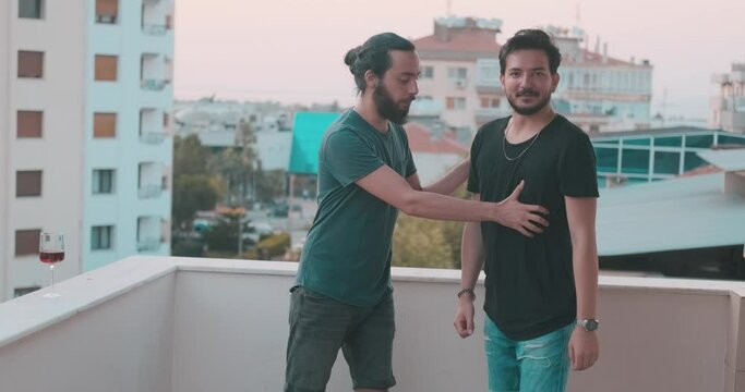 Young friends are rock paper scissors on holiday time. Cheerful friendship and game concept.
