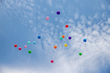 Air gel balls flying in the clear blue sky