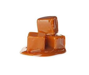 Caramel candies with topping on white background