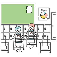 教室で机を運ぶ女子生徒たち