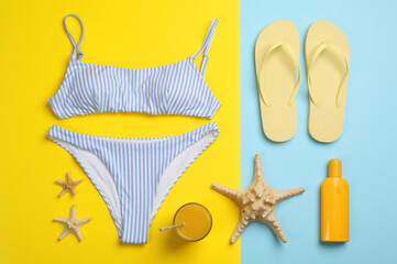 Flat lay composition with beach objects on color background