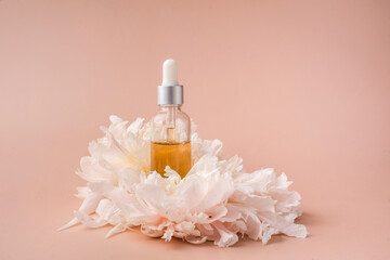Drop oil serum collagen moisturizer for face Soft light background. 