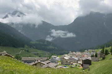 View of Simplon-dorf, a village located on the Simplon pass, the road can be seen in the background