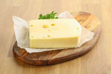 Maasdam cheese over the board