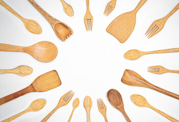set of wooden spoons on white background