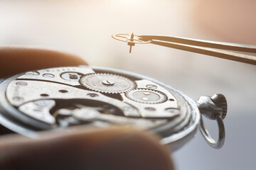 Watchmaker repair mechanical watches. Gears repair. Watch repair process