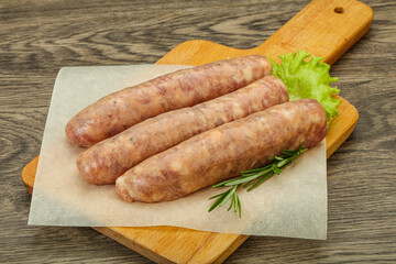 Raw pork meat sausages for grill