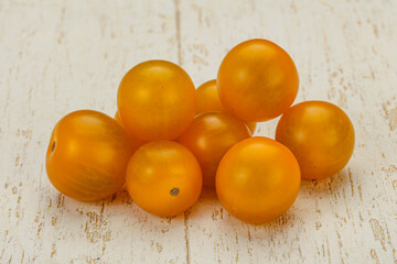 Fresh yellow cherry tomato heap