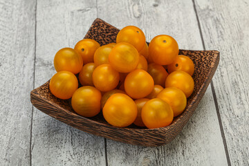 Fresh yellow cherry tomato heap