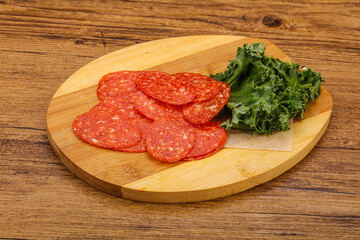 Italian spycy pepperoni sausage slices
