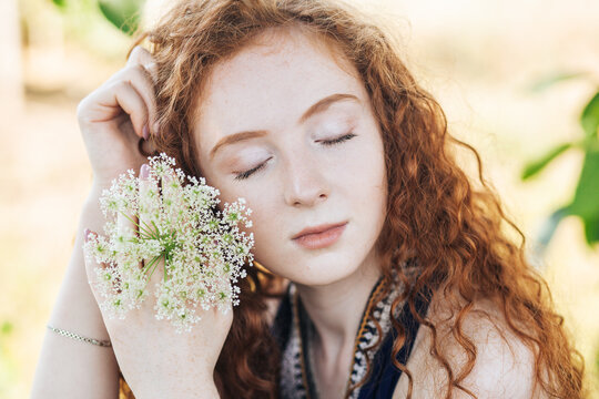 Red hair woman in the summer locations