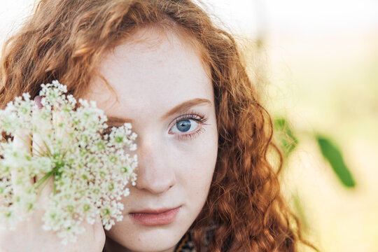 Red hair woman in the summer locations