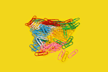 diversity of multicolored paper clips. office accessories