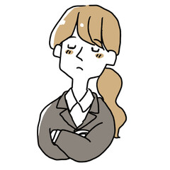 腕組みをして考え込んでいるスーツの女性