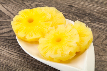 Sweet pineapple rings in the bowl