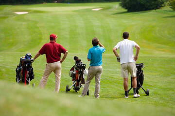 group of people on golf course