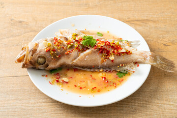 Steamed grouper fish with lime and chillies