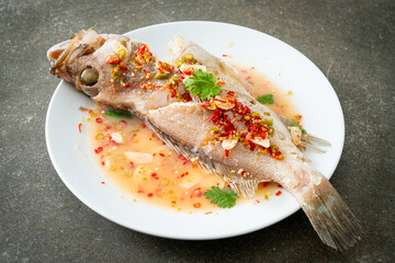 Steamed grouper fish with lime and chillies