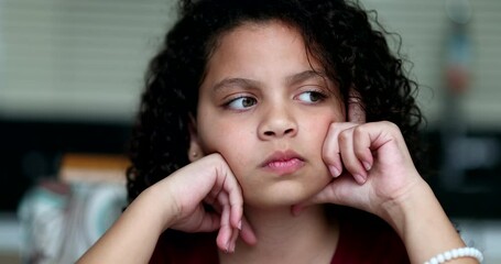 Little girl thinking about solution