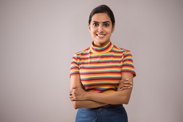 Portrait of a young woman smiling.