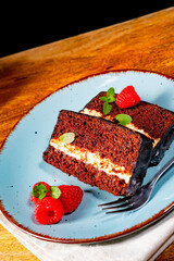 Rustic chocolate cake with raspberries and coffee