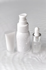 Fototapeta na wymiar cosmetic bottle cream packaging product on white water background