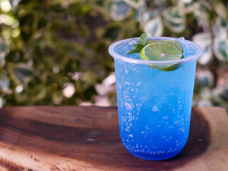 Cold and refreshing blue lemon soda.