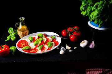 Tomato with mozzarella and basil
