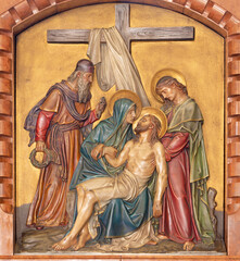 VIENNA, AUSTIRA - JUNI 18, 2021: The relief of Deposition of the cross in the Herz Jesu church from...