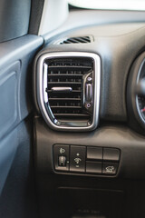 Obraz na płótnie Canvas Details of air conditioning (car ventilation system) in modern car