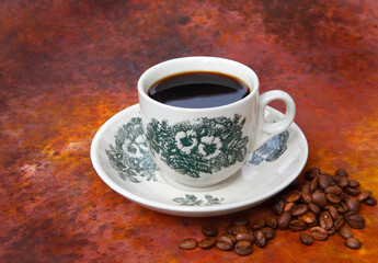 cup of coffee with beans-Traditional Kopi O commonly served in Malaysia and Singapore.