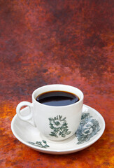 cup of coffee with beans-Traditional Kopi O commonly served in Malaysia and Singapore.