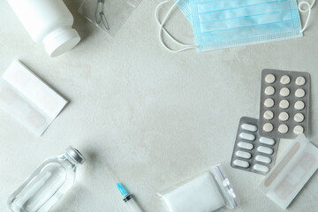 First aid medical kit on white textured table