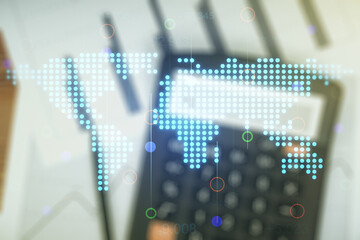 Double exposure of abstract digital world map on blurry calculator background, research and strategy concept
